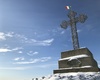 La croce del Cornizzolo imbiancata da una nevicata