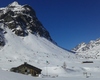 il versante est anticima corno Dosdé , a destra sullo sfondo il passo Viola e le cime Corno di Campo e Paradisino 