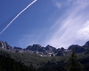 Vista sul massiccio del Tredenus, posto proprio di fronte al rifugio. Si possono osservare alcune sue cime, mete di arrampicata. Interessante nel cielo il contrasto cromatico. 